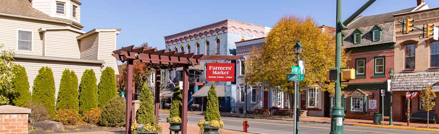 Farmers market sign in pleasant neighborhood